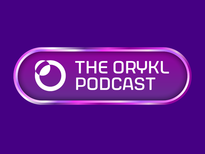 The image features a logo for a podcast titled "The Orykl Podcast." The background is a solid purple color, and the logo includes a rounded button with a light purple outline. Inside the button, there is a graphic that appears to represent sound or communication, along with the text "THE ORYKL PODCAST" displayed in white. The overall design is modern and vibrant, emphasizing the digital and audio nature of the podcast.