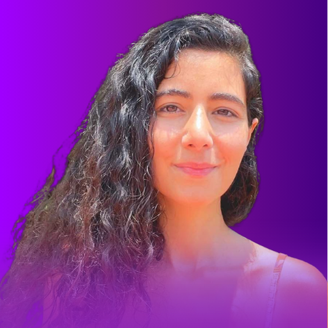 The image features a person with long, curly hair, shown from the shoulders up. The background is a gradient of purple hues, creating a vibrant and eye-catching effect. The person has a neutral expression and appears to be in natural light.