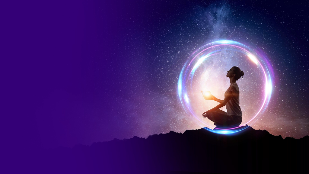 The image depicts a silhouette of a person in a meditative pose, seated on a rocky surface against a cosmic background with stars and a colorful circular glow around them. The scene conveys a sense of tranquility and connection to the universe, with a gradient of purple hues and a starry sky enhancing the mystical atmosphere.