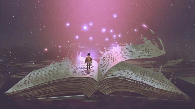 The image depicts an open book that appears to be floating or resting on an ethereal surface. A small figure stands on the pages of the book, gazing towards a mystical scene above. From the book, there are swirls of light or energy emanating upward, creating a magical atmosphere. The background is filled with soft purple hues, resembling a starry sky, enhancing the enchanting and imaginative quality of the scene.