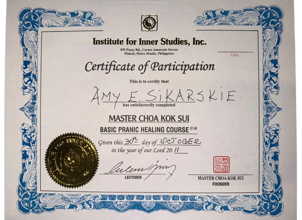 The image is a certificate of participation from the Institute for Inner Studies, Inc. It states that the individual has completed the "Basic Pranic Healing Course" by Master Choa Kok Sui. The certificate features a decorative border, a seal or emblem in the middle, and is dated October 30th, 2011. The certificate is signed by a lecturer and includes the name of the founder, Master Choa Kok Sui.