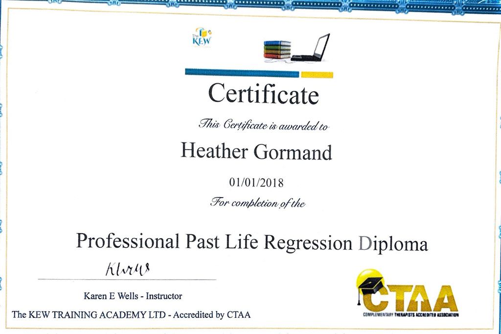 The image shows a certificate awarded to an individual for completing a course in "Professional Past Life Regression Diploma." The certificate features a header that indicates it is from "KEW" and includes a date of "01/01/2018." It is signed by an instructor and also mentions the organization CTAA, which stands for the Complementary Therapists Accredited Association. The design includes various graphical elements like a logo and decorative borders.