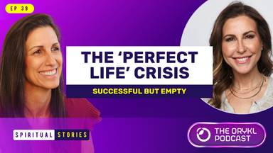 The image features promotional material for a podcast episode titled "THE ‘PERFECT LIFE’ CRISIS: SUCCESSFUL BUT EMPTY." It includes the text "SPIRITUAL STORIES" and "EP 39," indicating it is the 39th episode. There are two women depicted on the left side of the image, likely hosts or guests of the podcast, with smiles on their faces. The background is a gradient of purple tones. Additionally, a logo for the podcast is present in the bottom right corner. The overall design is vibrant and seems aimed at engaging listeners interested in personal development themes.
